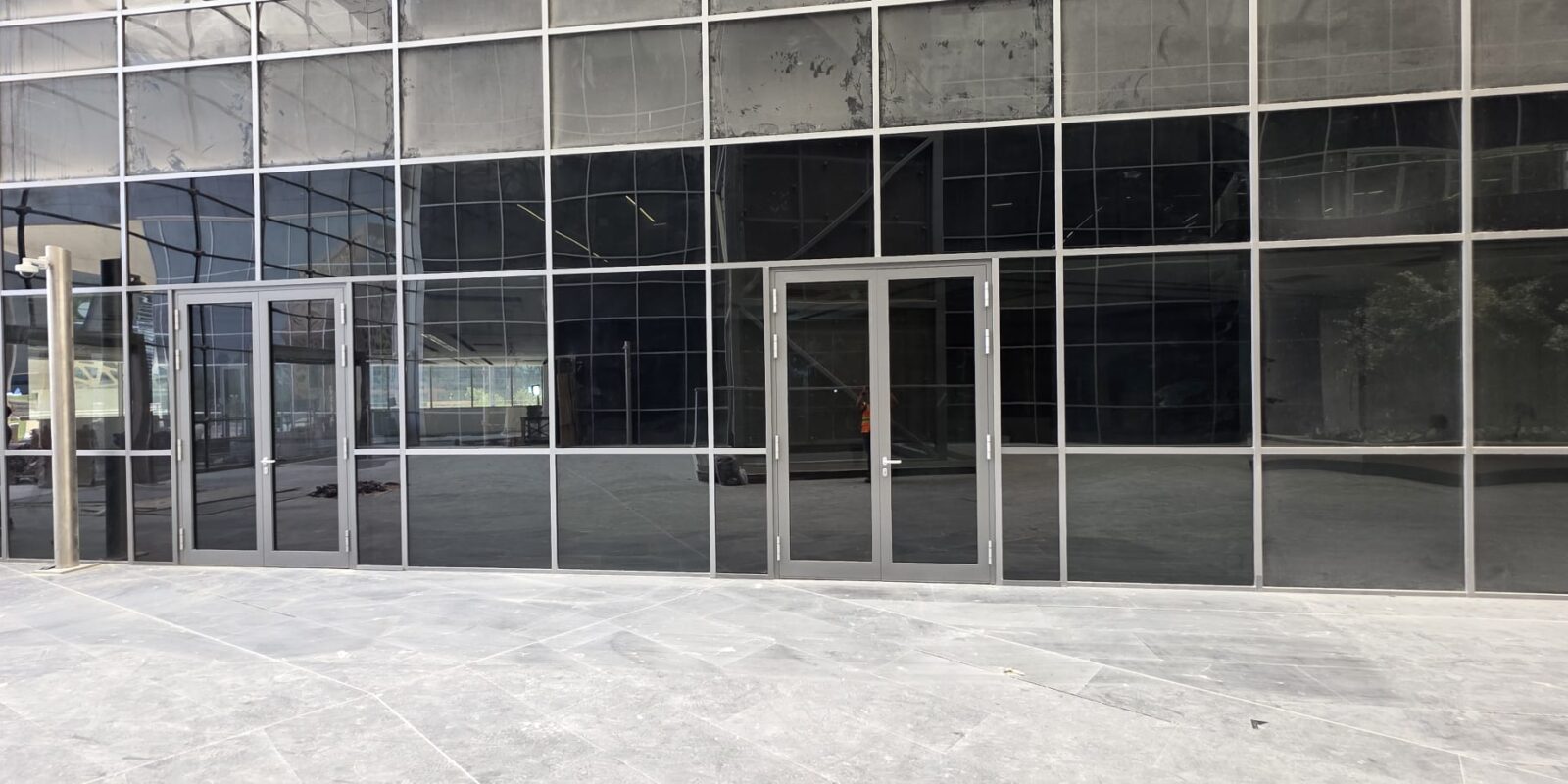 Atria Building Lusail – Aluminium Glazed Doors & Fixed Glass Partitions | Al Dana Technical Services & Engineering W.L.L